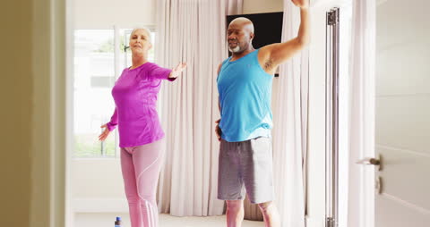 Senior Couple Enjoying Yoga and Relaxation at Home