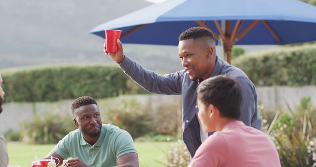 Friends Celebrating Outdoor with Red Plastic Cups - Download Free Stock Images Pikwizard.com