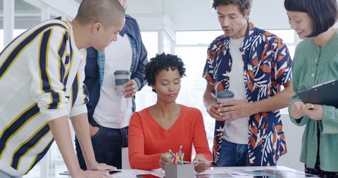 Diverse Team Collaborating in Bright Office During Creative Meeting - Download Free Stock Images Pikwizard.com