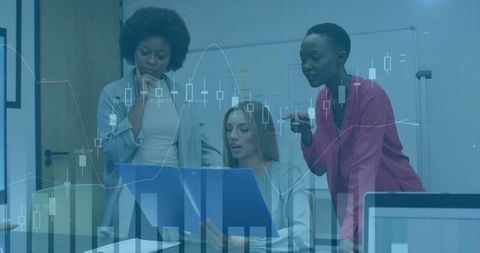Women Collaborate on Business Strategy with Financial Data Overlays