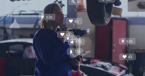 Female mechanic analyzing auto diagnostics in repair shop