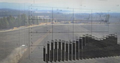 Farm tractor plowing field with 3d data visualization for innovation