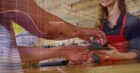 Digital payment transaction with financial graphs overlay