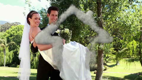 Joyous Newlyweds Embracing in Sunlit Park