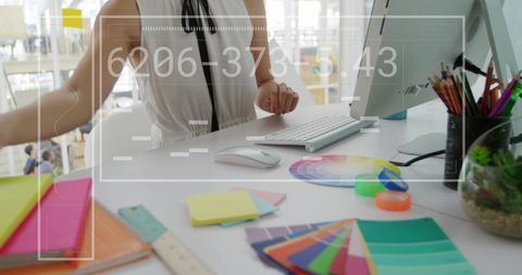 Businesswoman Analyzing Financial Data at Computer Desk - Download Free Stock Images Pikwizard.com