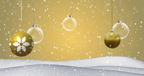 Festive Holiday Scene with Snow and Golden Baubles