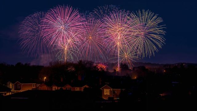 Spectacular Fireworks Display Over Suburban Neighborhood