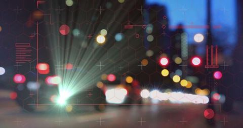 Blurred city night lights with futuristic red hex grid overlay