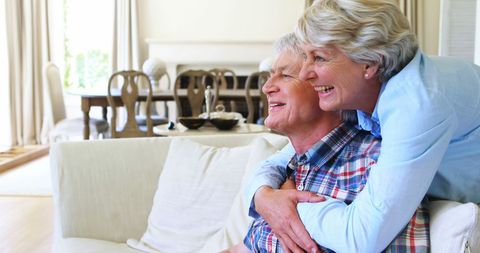 Happy Senior Couple Relaxing in Bright Living Room - Download Free Stock Images Pikwizard.com