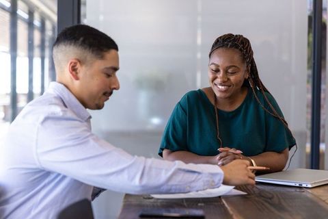 Collaborative Business Meeting in Modern Office Space
