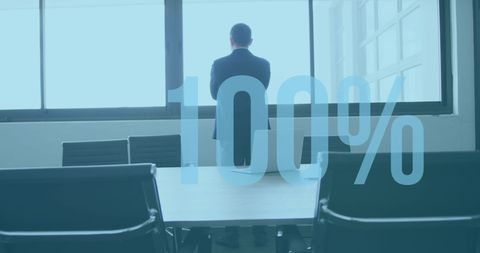 Businessman achieving success, blue percentage overlay illustrating growth