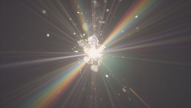 Glowing Prism Cluster Emitting Rainbow Light in Dark Space