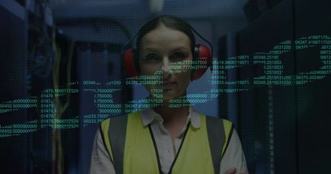 IT Engineer Overseeing Data Streams in Server Room - Download Free Stock Images Pikwizard.com