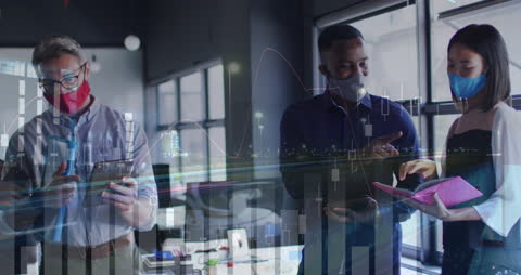 Masked Colleagues Analyzing Business Data in Office Environment