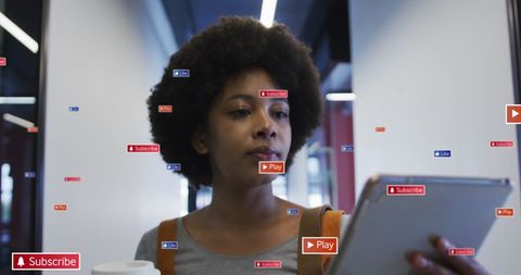 Businesswoman analyzing social media data with digital interface