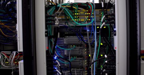 Data Center with Wired Server Racks and Blinking Lights - Download Free Stock Images Pikwizard.com
