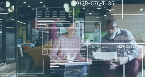 Diverse Team Analyzing Data for Digital Innovation in Office