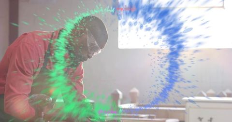 Crafting wooden bowl on lathe wearing goggles with vibrant digital paint swirl overlay