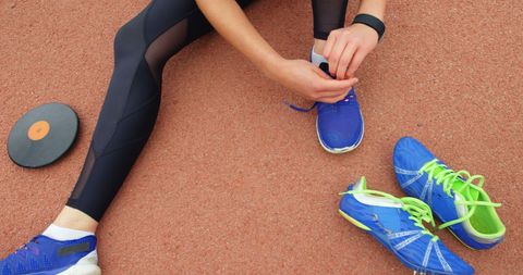 Female Athlete Preparing for Discus Throw - Download Free Stock Images Pikwizard.com