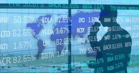 Businessman analyzing global data and financial interface