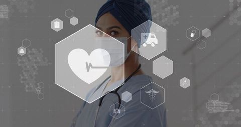 Asian clinician in corridor wearing mask and stethoscope with hexagonal telemedicine hud