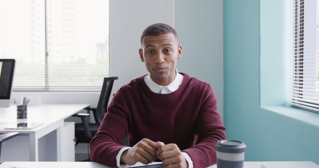 Confident Businessman in Modern Office Smiling at Camera - Download Free Stock Images Pikwizard.com