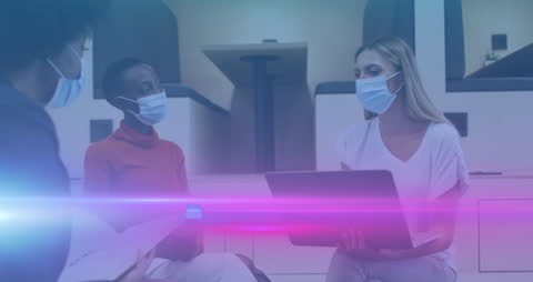 Diverse Professionals Discussing Business While Wearing Masks