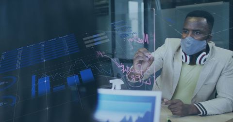 Businessman Analyzing Financial Data with Mask in Modern Office
