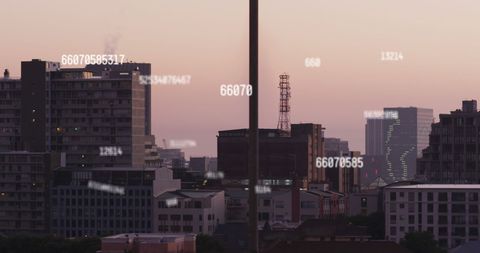 Digital Numbers Overlaying Cityscape at Dusk