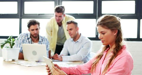Professional Woman Using Digital Tablet in Modern Office Workspace - Download Free Stock Images Pikwizard.com