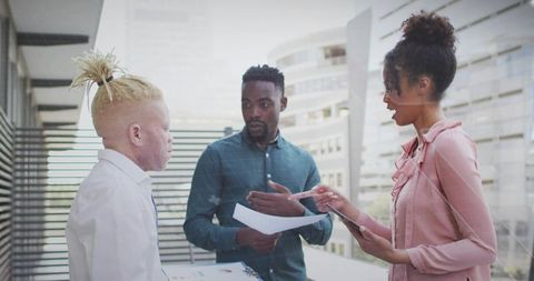 Teamwork and Collaboration on Modern Office Balcony
