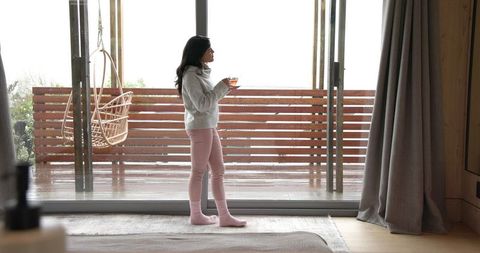 Woman Enjoying Tranquil Morning with Scenic View