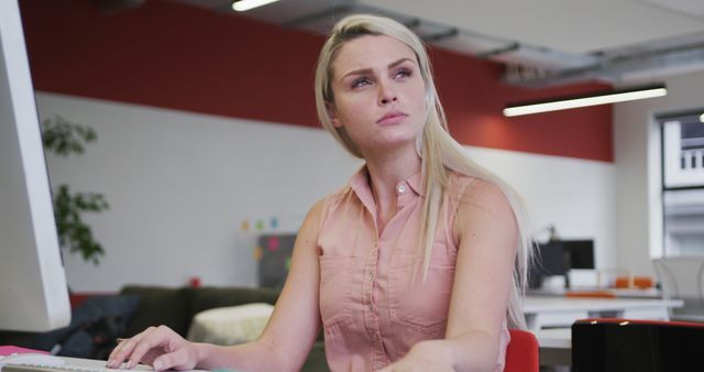 Young Businesswoman Concentrating in Modern Office - Download Free Stock Images Pikwizard.com