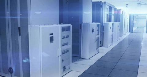 Modern data center with white server cabinets and breaker panels