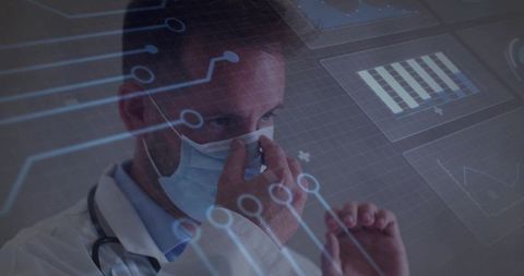 Doctor with Digital Interface Touch Screen in Medical Setting