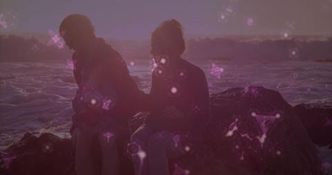 Silhouette Family Ocean Sunset with Glowing Symbols