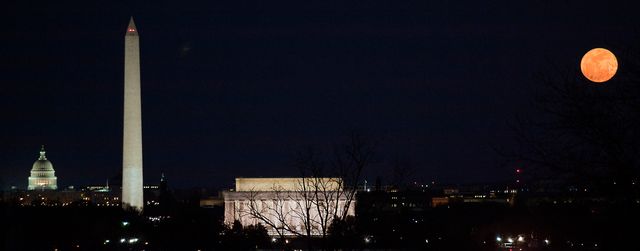 The full moon is seen as it rises near the National Mall, Saturday, March 19, 2011, in Washington. The full moon tonight is called a "Super Moon" since it is at its closest to Earth. Photo Credit: (NASA/Paul E. Alers)