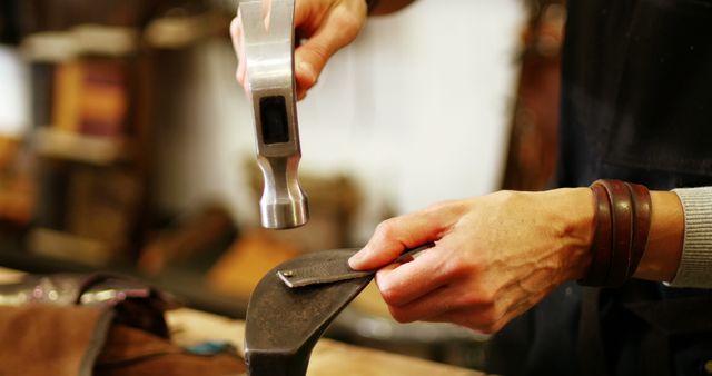 Craftswoman Nailing Leather Skillfully in Workshop Scene - Download Free Stock Images Pikwizard.com