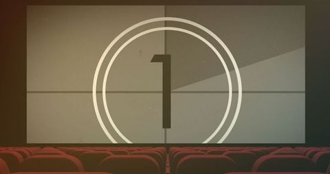 Vintage Film Countdown on Movie Theater Screen with Red Seats