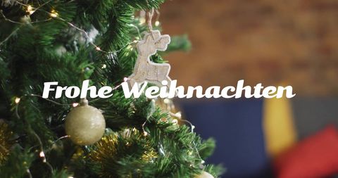 Festive Decorated Christmas Tree with 'Frohe Weihnachten' Text - Download Free Stock Images Pikwizard.com