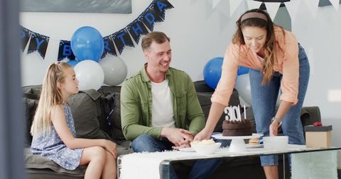 Happy Birthday Celebration with Family in Living Room Atmosphere