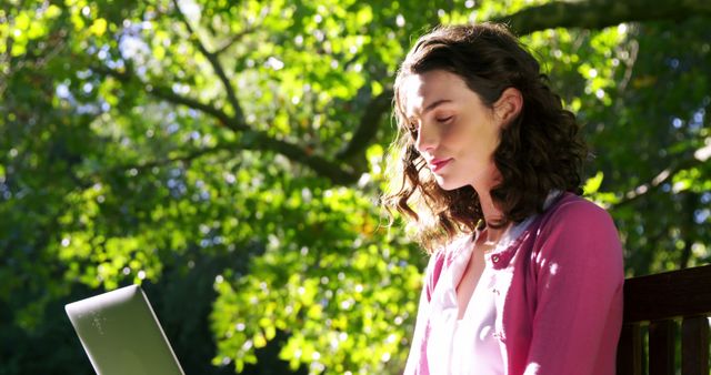 Young Woman Studying Outdoors on Laptop in Sunny Park - Download Free Stock Images Pikwizard.com