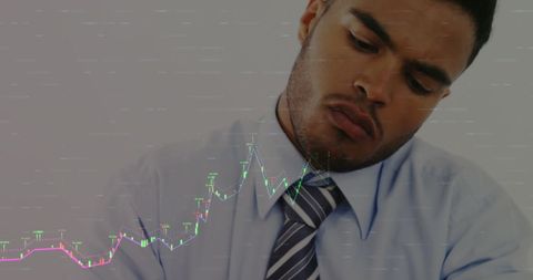 Businessman Analyzing Financial Data with Overlay