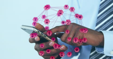 Businessman Using Smartphone with Overlay of Technology Icons