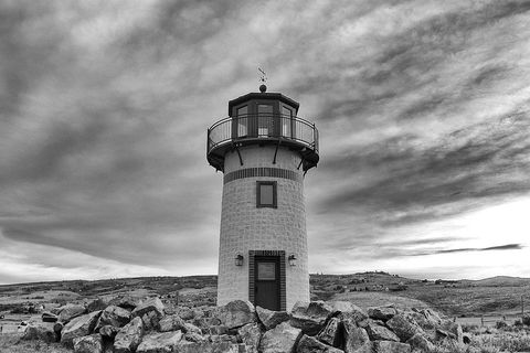 Scenic Lighthouse Overlooking Rugged Landscape
