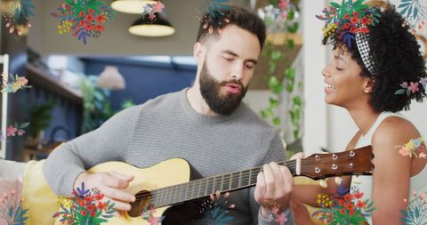 Happy Couple Enjoying Music and Guitar Together at Home