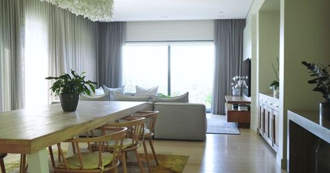 Minimalist Open-Plan Living and Dining Room with Wooden Decor