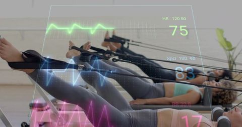 Three Women Doing Reformer Pilates With Biometric HUD Showing Heart Rate SpO2 Respiration