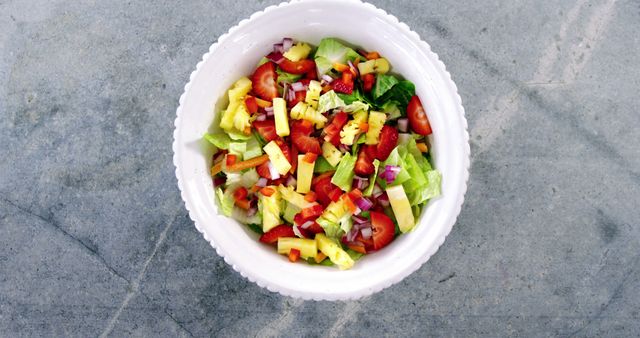 Fresh Summer Salad Bowl with Pineapple and Vegetables on Stone Table - Download Free Stock Images Pikwizard.com