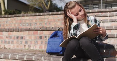 Young Girl Reading Outdoor Book Leisure Blue Backpack